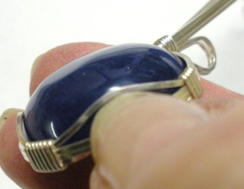Judy Larson's Sweetheart Pendant - , Classic Wire Jewelry, Wire Wrapping, Wrapping, Wire Wrapping Jewelry, Use your thumbnail to separate and push up the top wire on either side of center bottom.  